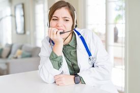 beautiful-young-doctor-woman-wearing-headset-looking_cg3p03872356c_t_20190628-191022_1